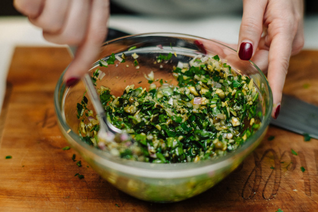 this salsa verde uses parsley, lemon, shallots, capers, pepitas, salt, pepper and olive oil