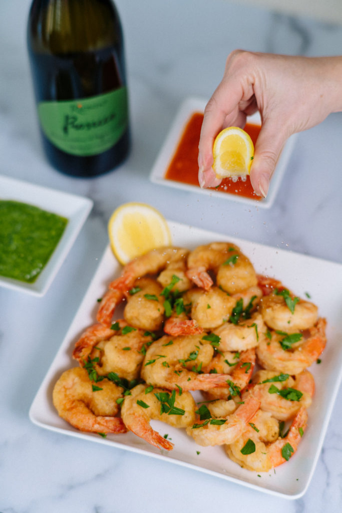 Italian style fried shrimp served with fresh squeezed lemon and Riondo Prosecco. eisforeat.com