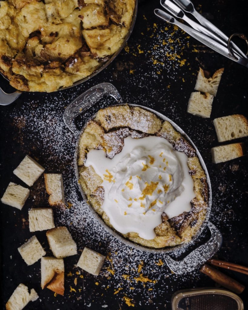 Cinnamon Raisin Challah Bread Pudding with Maple Whipped Cream and Orange Zest