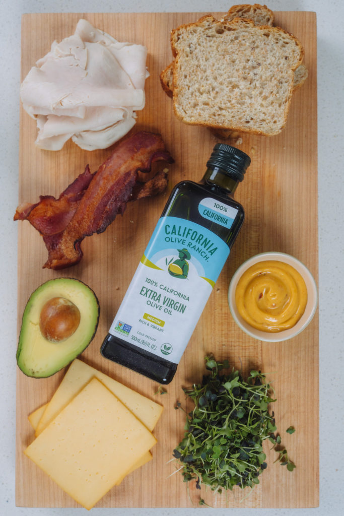 California Olive Ranch 100% California Extra Virgin Olive Oil with turkey sandwich ingredients